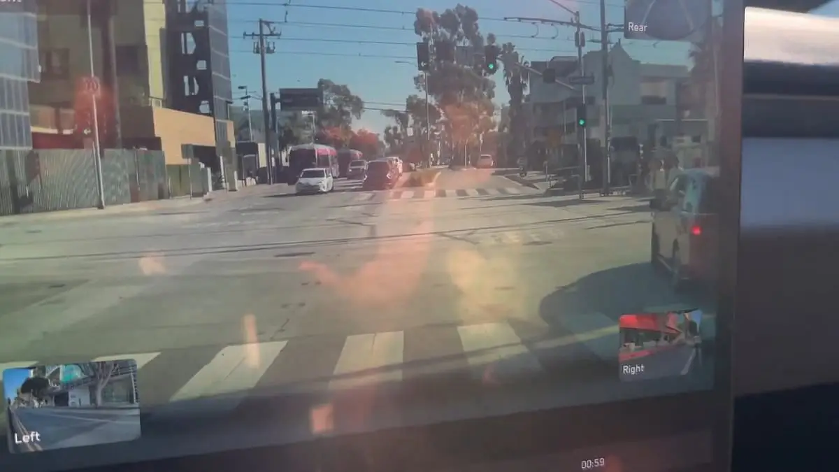 Terrifying moment self-driving Tesla turns onto train tracks with AI CEO in car