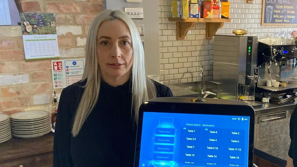 Alphonso the robot waiter delighting cafe visitors